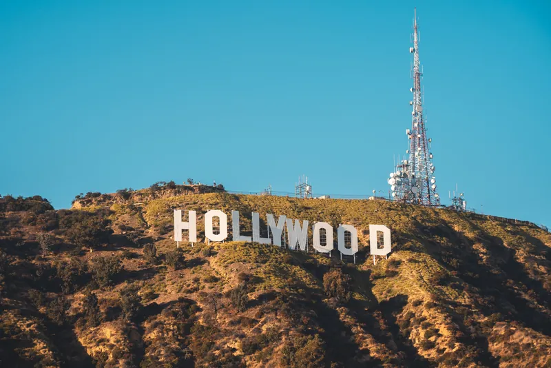 Iconic Hollywood Sign on a sunny day in Los Angeles, California.