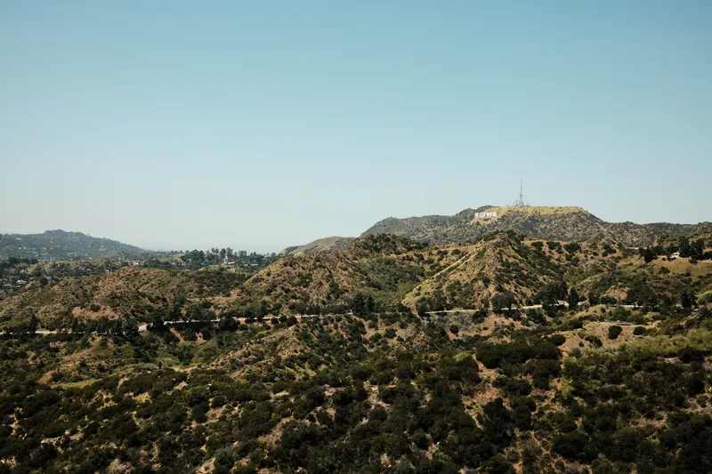 Captivating landscape of Los Angeles's Hollywood Hills with the iconic Hollywood Sign in view.