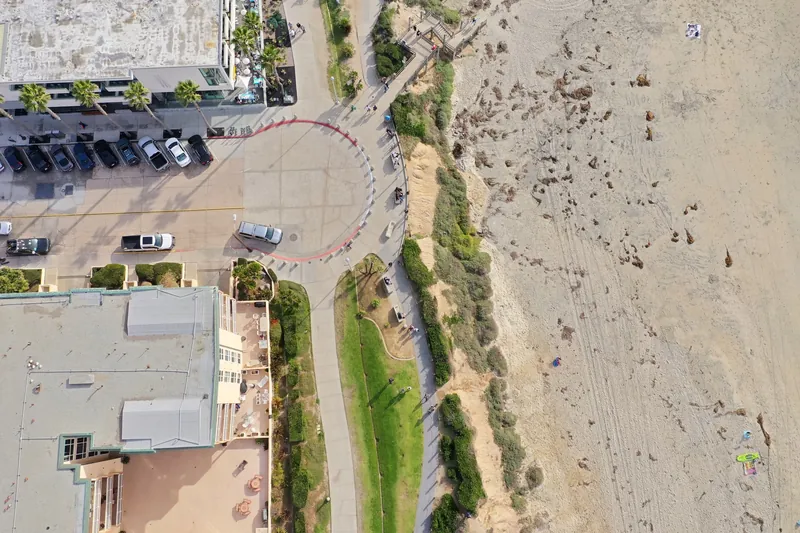 Aerial photograph of San Diego's beachfront, capturing urban architecture and sandy shore. Perfect for travel and architecture themes.