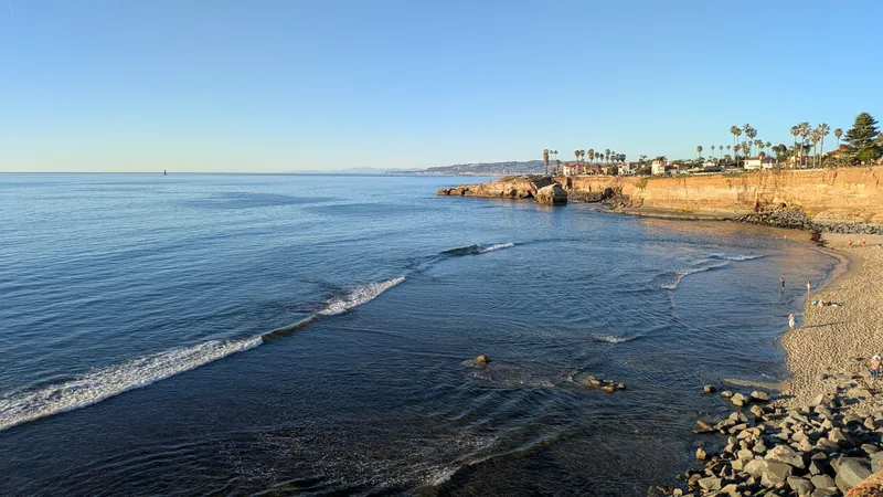Beautiful view of the Pacific Ocean at Sunset Cliffs, San Diego with cliffs and beach in the foreground.