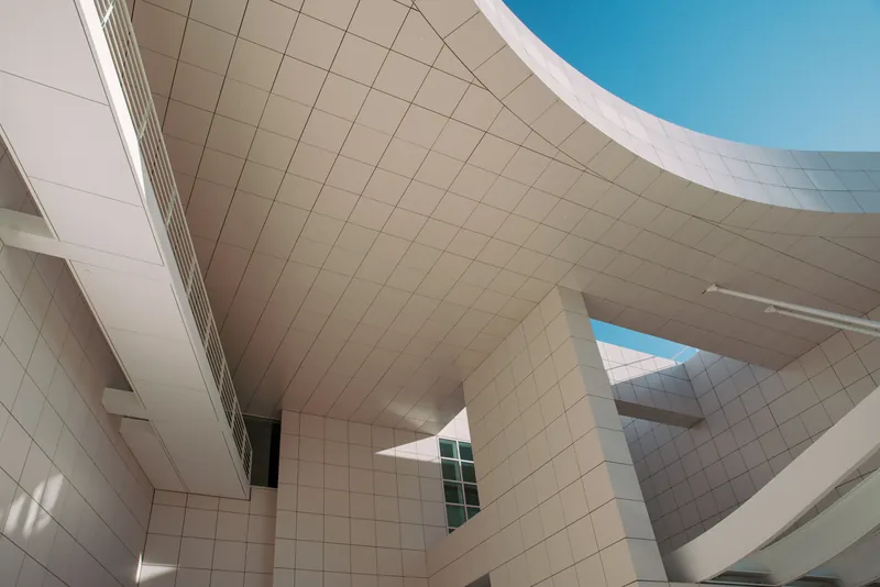 Low-angle view of modern architecture with geometric patterns in Los Angeles, CA